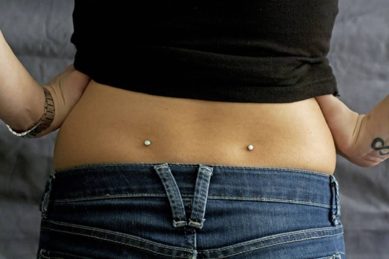 Back dimple piercing